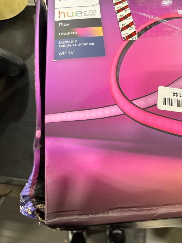 Photo 3 of Philips Hue Gradient LightStrip 65" (Sync with TV, Music and Gaming), Hue Hub & Hue Sync Box Required 65-Inch TV Lightstrip Only
BOX IS DAMAGED