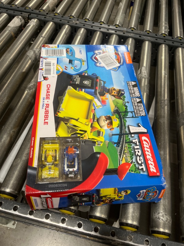 Photo 2 of Carrera First Paw Patrol - Slot Car Race Track - Includes 2 Cars: Chase and Rubble - Battery-Powered Beginner Racing Set for Kids Ages 3 Years and Up Paw Patrol - On a Roll