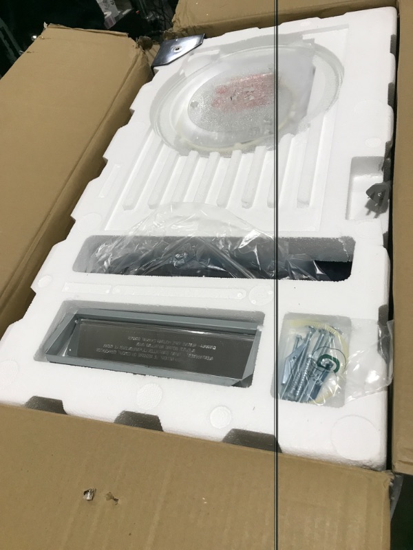 Photo 1 of 1.7 cu. ft. 1000-Watt Over the Range Microwave in Black