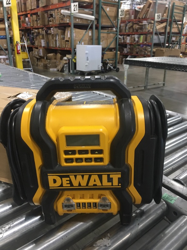 Photo 2 of DEWALT DXAEPS14 1600 Peak Battery Amp 12V Automotive Jump Starter/Power Station with 500 Watt AC Power Inverter, 120 PSI Digital Compressor, and USB Power , Yellow