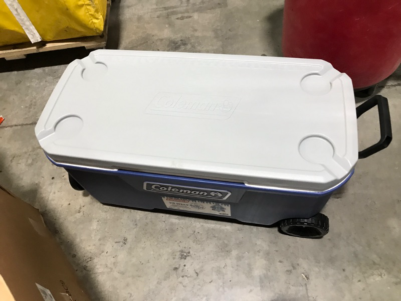 Photo 5 of Coleman 316 Series Insulated Portable Cooler with Heavy Duty Wheels, Leak-Proof Wheeled Cooler with 100+ Can Capacity, Keeps Ice for up to 5 Days Twilight 100qt Coolers - MISSING HINGE - BOTTOM IS DAMAGED- 