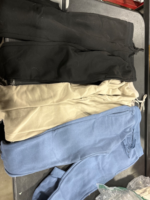 Photo 1 of 3 sweat pants for kids black blue and kaki size L