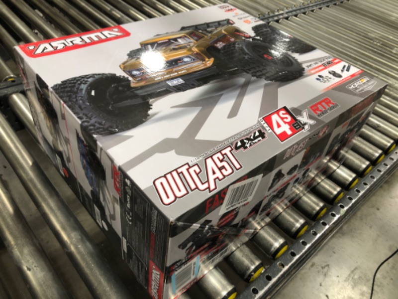 Photo 5 of ARRMA RC Truck 1/10 Outcast 4X4 4S V2 BLX Stunt Truck RTR (Battery and Charger Not Included), Bronze, ARA4410V2T1