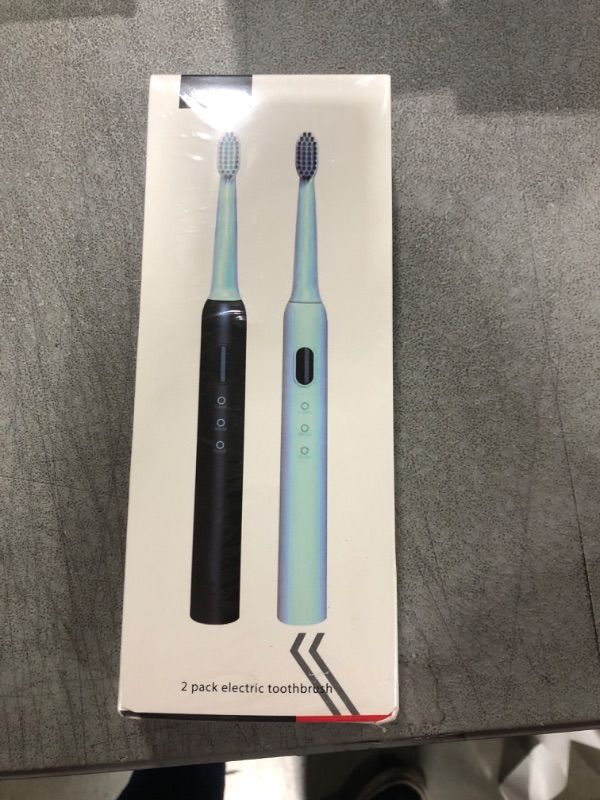 Photo 1 of 2 Pack Electric Toothbrush with 12 Dupont Brush Heads, 3 Modes 4000vpm, IPX7 Waterproof, Travel Electric Toothbrush for Adults and Kids Black+White

