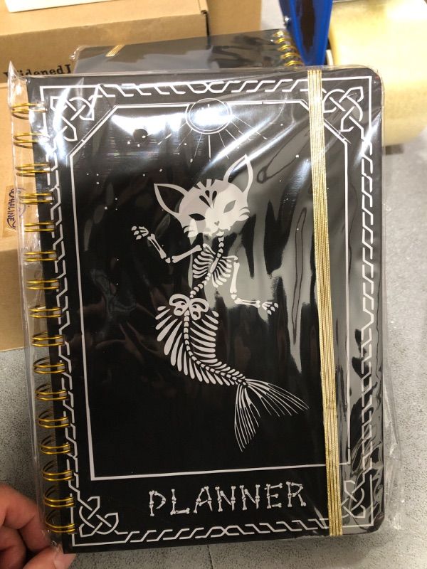 Photo 1 of 2024 Planner, 12-Month Weekly Monthly Planner from JAN.2024 to DEC.2024, 8.4" X 6", Planner Notebook with Spiral Bound, Stickers & Sticky Index Tabs, Fox-Fish Skull Black - 01