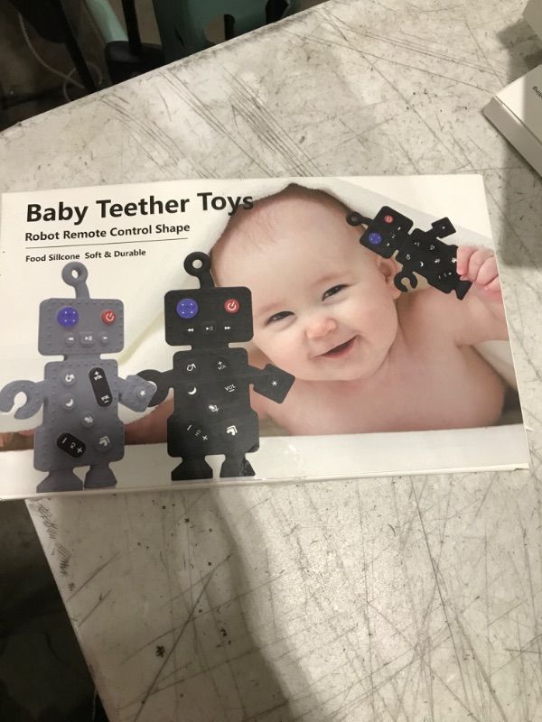 Photo 1 of Baby Teething Toys, DDMY Sensory Cell Phone Shape Silicone Toddler Teething Toys for Babies 0-6-12-36 Months, Baby Chew Toys for Sucking Needs, Baby Toys Teething Pacifiers Toys (2 Pack)grey / black 