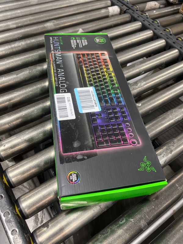 Photo 6 of Razer Huntsman V2 Analog Gaming Keyboard: Adjustable Actuation via Analog Optical Switches - Rapid Trigger Mode - Chroma RGB Lighting - Magnetic Wrist Rest - Dedicated Media Keys & Dial - Black
