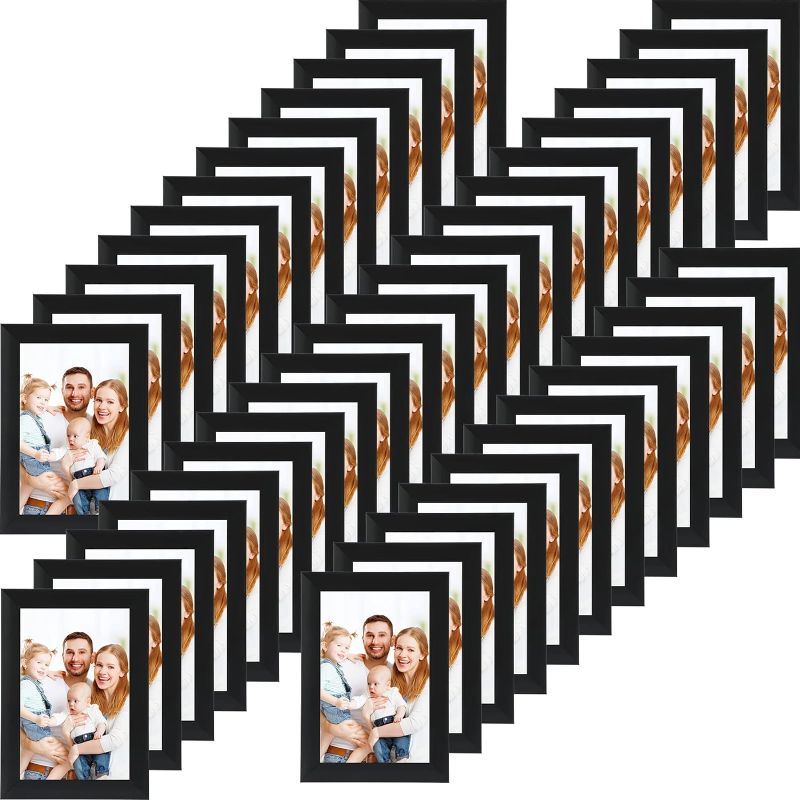 Photo 1 of Picture Frame Set of 50 Black Photo Frame Bulk Gallery Picture Photo Frame Classic Simple Wall Collage Display Frame with Mat for Tabletop Home Office Display and Wall Hanging (5 x 7 Inch)
