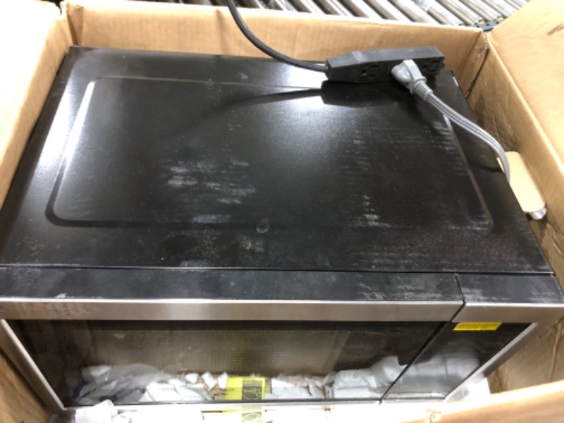 Photo 2 of GE .9 Cu. Ft. Capacity Countertop Microwave Oven - Black