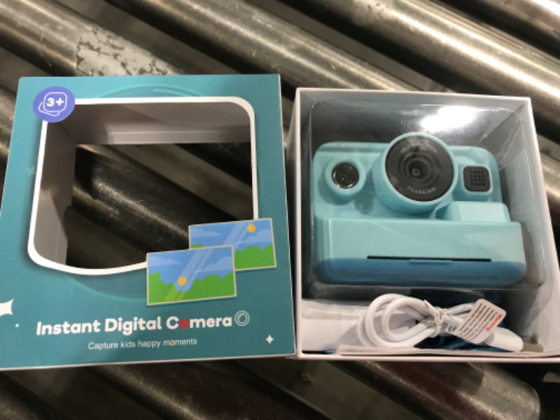 Photo 1 of INSTANT DIGITAL CAMERA, BLUE