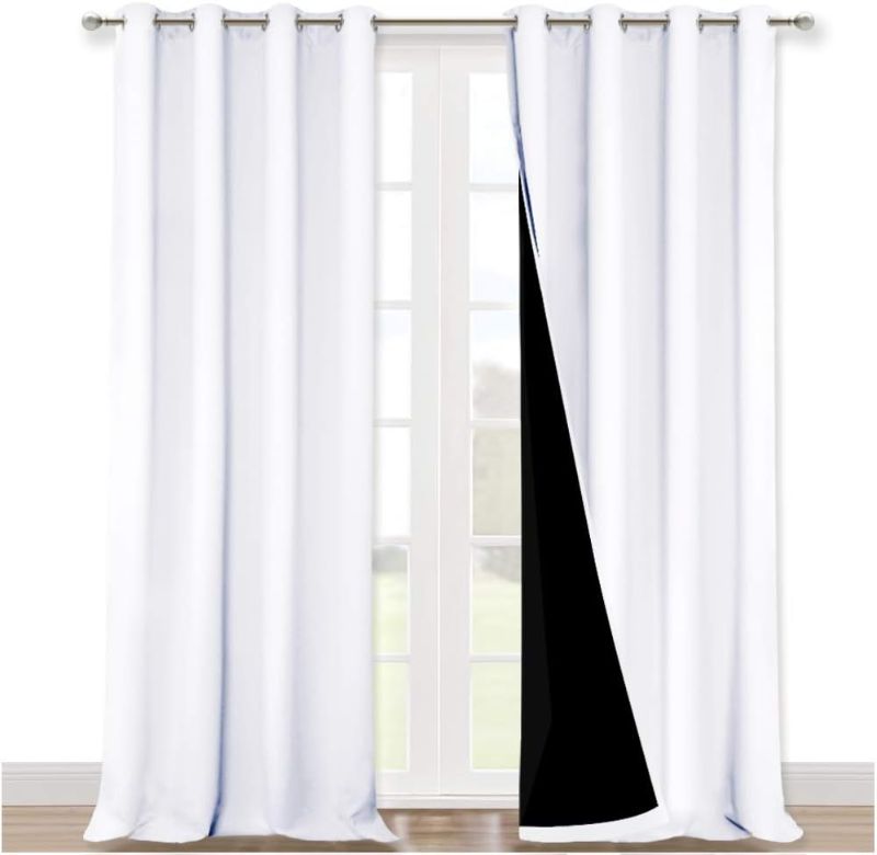 Photo 1 of NICETOWN Room Warming Full Shading Curtains for Windows, Super Heavy-Duty Black Lined Blackout Curtains for Bedroom, Privacy Assured Window Treatment (White, Pack of 2, 52 inches W x 95 inches L) 