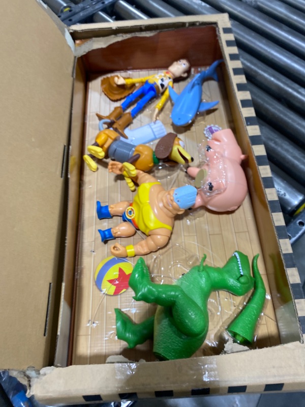 Photo 2 of Disney and Pixar Toy Story Set of 7 Action Figures with Woody, Slinky, Rex, Hamm, Alien, Rocky & Shark, Disney100 Collectible [Amazon Exclusive]