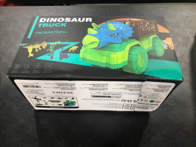 Photo 2 of TEMI Dinosaur Truck Toy for Kids 3-5 Years, Triceratops Transport Car Carrier Truck with 8 Dino Figures, Activity Play Mat, Dino Eggs and Trees, Capture Jurassic Dinosaur Play Set for Boys and Girls Triceratops Dino Truck