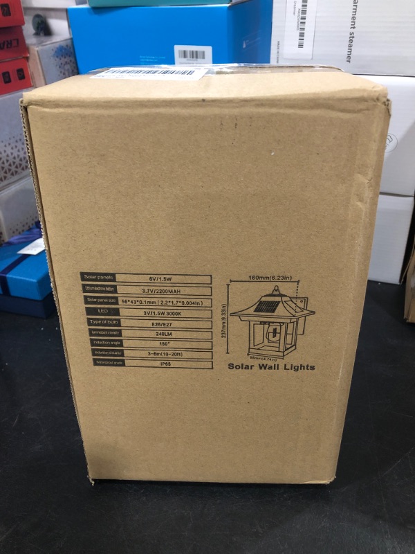 Photo 1 of Solar Outdoor Wall Light, Solar Motion Sensor Light with 3 Modes and IP65 Waterproof, Dusk to Dawn Exterior Solar Light for Patio Yard Garage