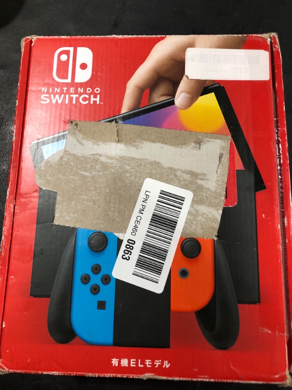 Photo 1 of Nintendo Switch – OLED Model w/ Neon Red & Neon Blue Joy-Con