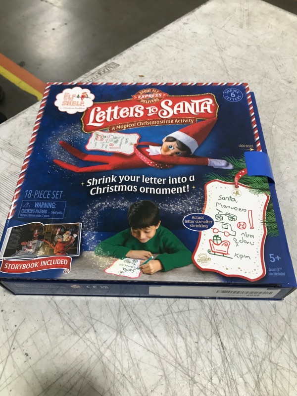 Photo 3 of The Elf on The Shelf: Letters to Santa - Send Shrinking Christmas Lists to Santa through your Elf- 18 Piece Gift Set Includes Magic X-mas Paper, Mrs Claus' Press, Ribbon Sashes, Markers, and Parchment
