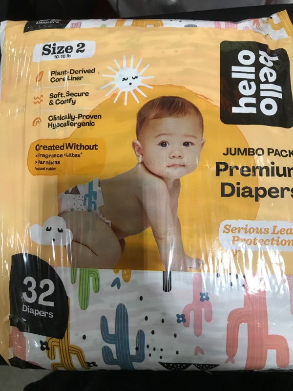 Photo 1 of 32 Pack of size 2 diapers 