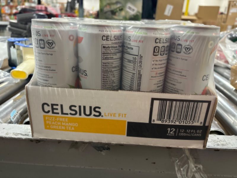 Photo 2 of CELSIUS Peach Mango Green Tea, Functional Essential Energy Drink 12 Fl Oz (Pack of 12) Peach Mango Green Tea 12 Fl Oz (Pack of 12)