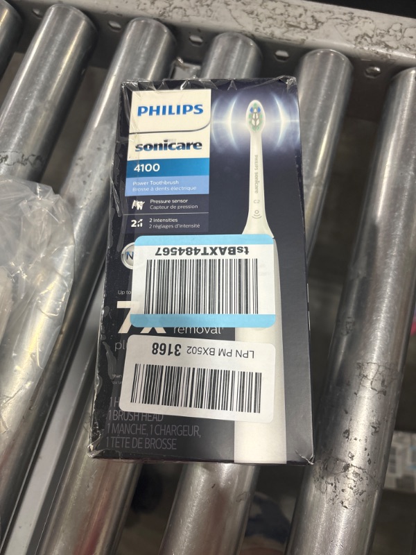 Photo 2 of Philips Sonicare 4100 Power Toothbrush, Rechargeable Electric Toothbrush with Pressure Sensor, White HX3681/23 White New 4100
