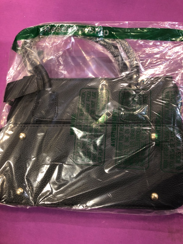 Photo 1 of black purse 