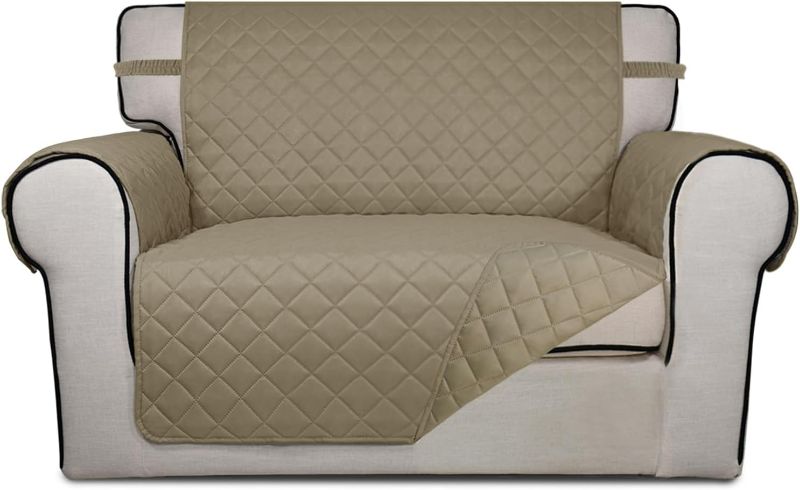 Photo 1 of PureFit Reversible Quilted Sofa Cover, Water Resistant Slipcover Furniture Protector, Washable Couch Cover with Non Slip and Elastic Straps for Kids, Dogs, Pets (Oversized Chair, Beige/Beige)
