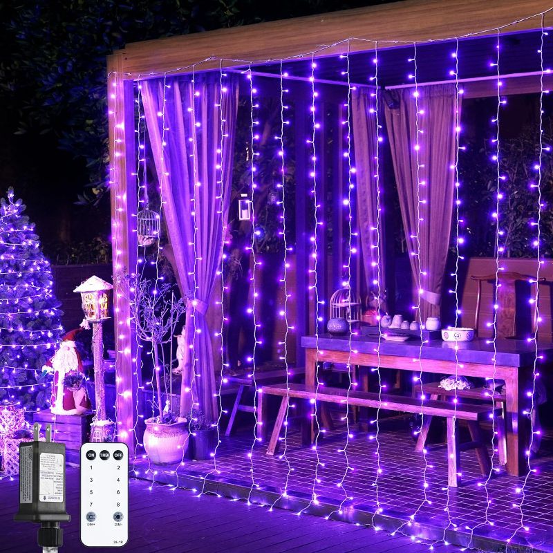Photo 1 of JMEXSUSS 400LED Purple Curtain Lights with Remote, Christmas Curtain Hanging Lights Plug in, 8 Modes Purple String Lights for Bedroom Window Wall Party Backdrop Halloween Christmas Decorations