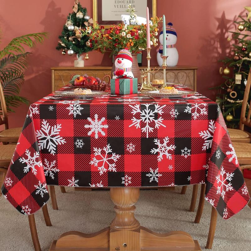 Photo 1 of SASTYBALE Christmas Tablecloth Rectangle Vinyl with Flannel Backing, Buffalo Plaid Snowflake Print, Waterproof & Heavy Duty Plastic Table Cover for Dining, Party, Holiday, 52 x 70 Inch Red and Black