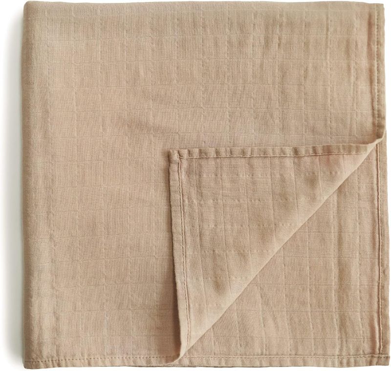 Photo 1 of mushie Muslin Baby Swaddle Blanket | 100% Organic Cotton (Pale Taupe)