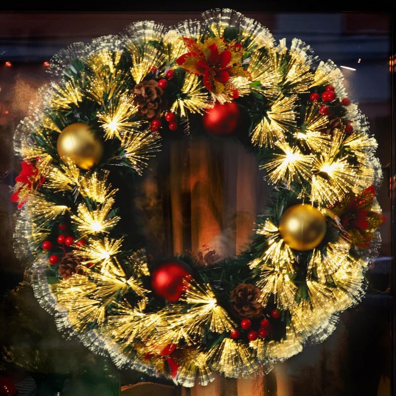 Photo 1 of Pre-lit Christmas Wreath 24" Extra Large Christmas Wreath Artificial Deluxe Lighted Plug in Christmas Decorations Ornament with Lights Door Window Fireplace Decor 10ft Cable