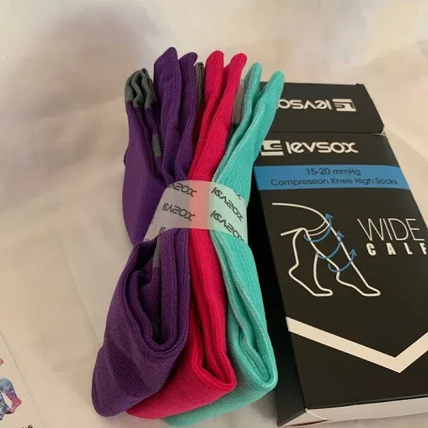 Photo 1 of Wide Calf Compression Socks for Women & Men Extra Large Size Support Socks for Nurses Running Pregnant Travel, 15-20 mmHg 3 pair of sock: purple,pink & teal