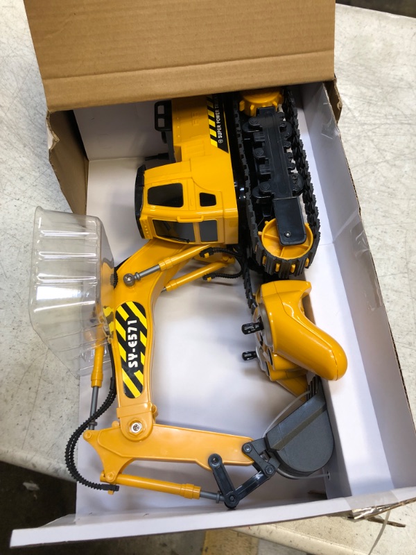 Photo 1 of DOUBLE  Control Excavator Toy 