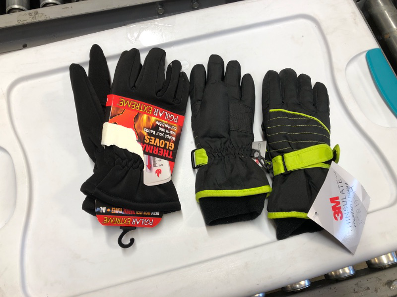 Photo 1 of 2 pack of gloves medium and small 