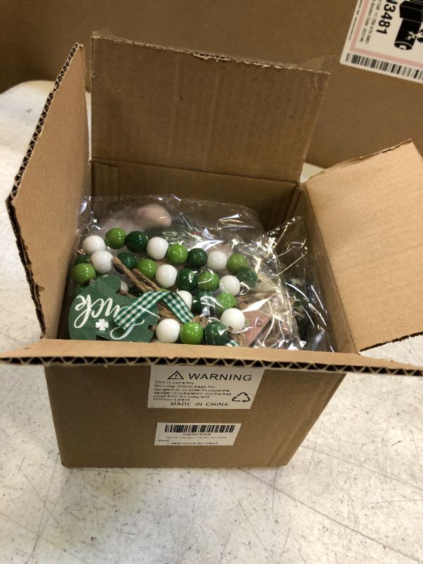 Photo 1 of St Patricks Day Decor - LED St Patrick's Day Decorations for Home Table - Lighted Up Tiered Tray Decor 6 PCS - 3 Saint Patricks Wooden Signs - Plush Gnome - Wood Beads Garland - Mini Wooden Banner
