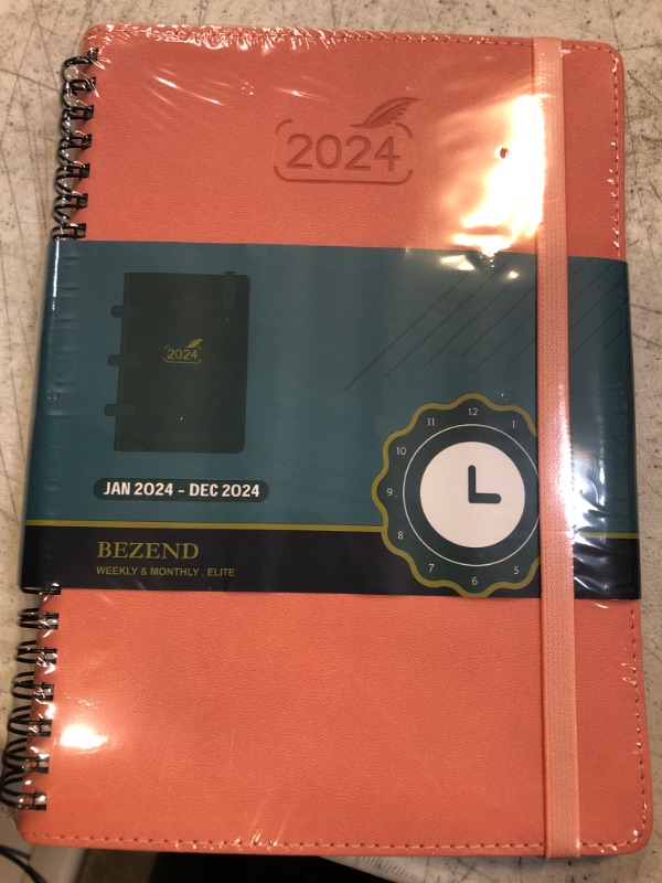 Photo 2 of 2024 Planner by BEZEND, A5 Calendar 5.8" x 8.5", Daily Weekly and Monthly Agenda,Spiral Bound,FSC Certified 100GSM Paper, Vegan Leather Soft Cover - Pink Pink 12 Months 5.8" x 8.5"