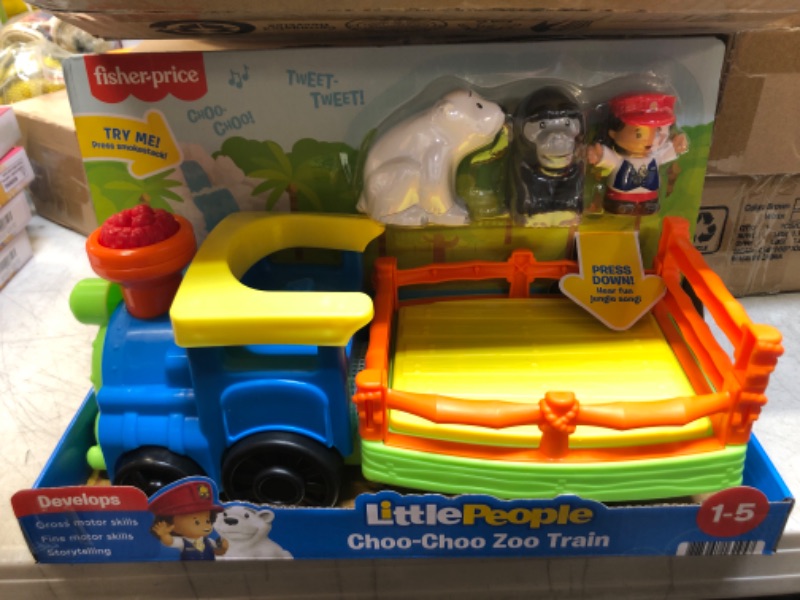 Photo 1 of Fisher-Price Little People Toddler Toy Train Choo-Choo Zoo with Music Sounds and 3 Figures for Pretend Play Ages 1+ Years