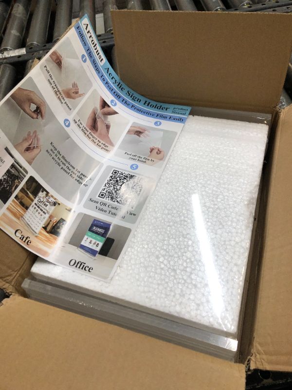 Photo 1 of Arrobust 8.5 x 11 Acrylic Sign Holder Clear Table Signs Stand, Double Sided T Shape Flyer Holder Plastic for Picture Paper Card Home Office Menu Retail Show Fair, 6 Pack Vertical 6 Pack 8.5x11 Inch