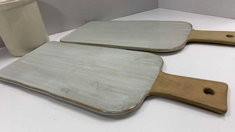 Photo 1 of 2-HEARTH & HAND STONEWARE CUTTING BOARDS 7” X 17” AND A PORCELAIN UTENSIL CROCK