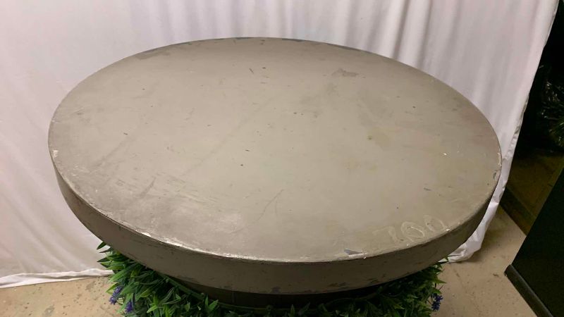 Photo 1 of METAL DRUM TABLE WITH FAUX LAVENDER FLOWERS AND GRASS WRAP 30” X 39”