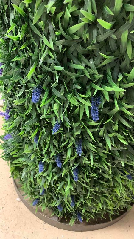 Photo 1 of METAL DRUM TABLE WITH FAUX LAVENDER FLOWERS AND GRASS WRAP 30” X 39”