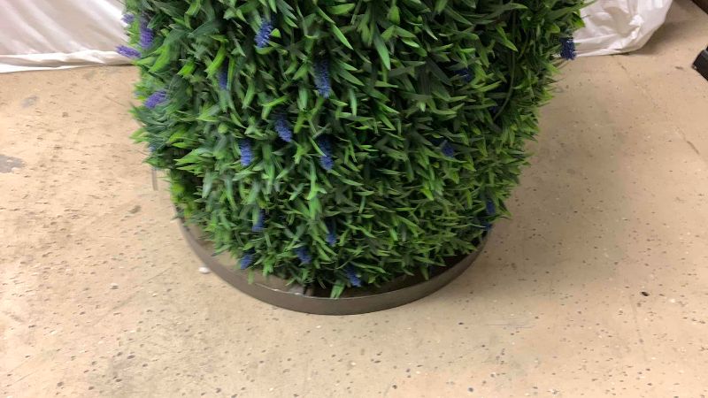 Photo 1 of METAL DRUM TABLE WITH FAUX LAVENDER FLOWERS AND GRASS WRAP 30” X 39”