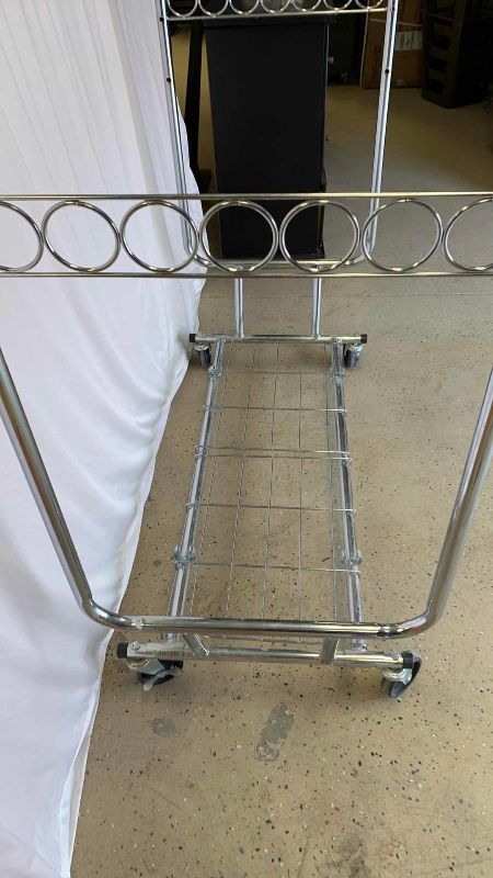 Photo 1 of CLOTHING RACK WITH WHEELS
