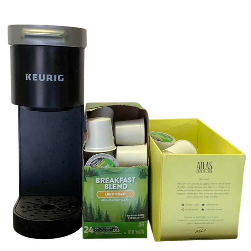 Photo 1 of KEURIG COFFEE MACHINE AND K-CUPS