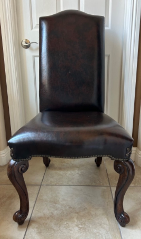 Photo 10 of LEATHER DINING SIDE CHAIR WITH CROSS DETAIL AND STUDS EMBELISHMENT 23” x 24” x 45