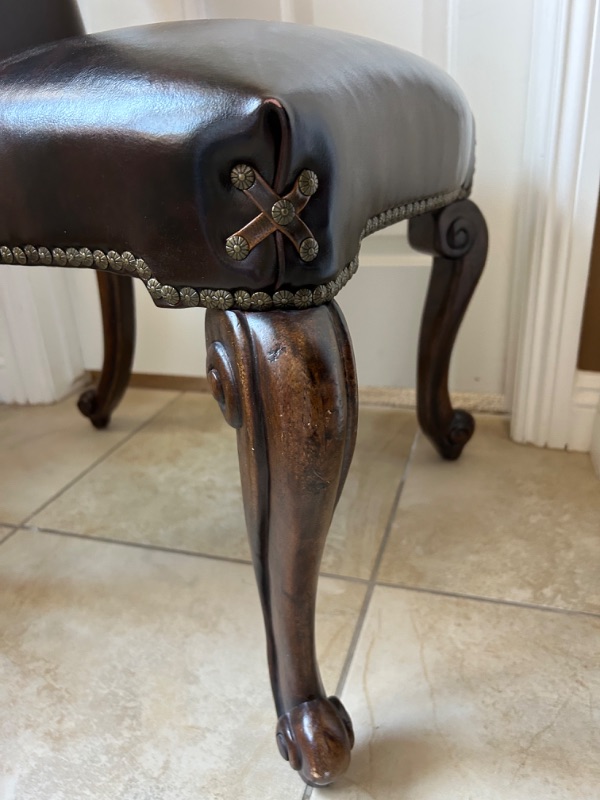 Photo 9 of LEATHER DINING SIDE CHAIR WITH CROSS DETAIL AND STUDS EMBELISHMENT 23” x 24” x 45