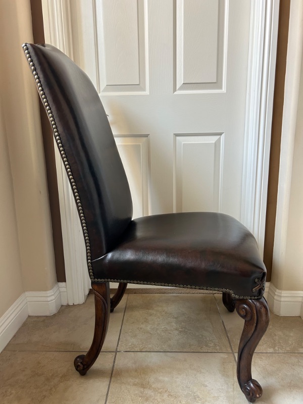 Photo 3 of LEATHER DINING SIDE CHAIR WITH CROSS DETAIL AND STUDS EMBELISHMENT 23” x 24” x 45