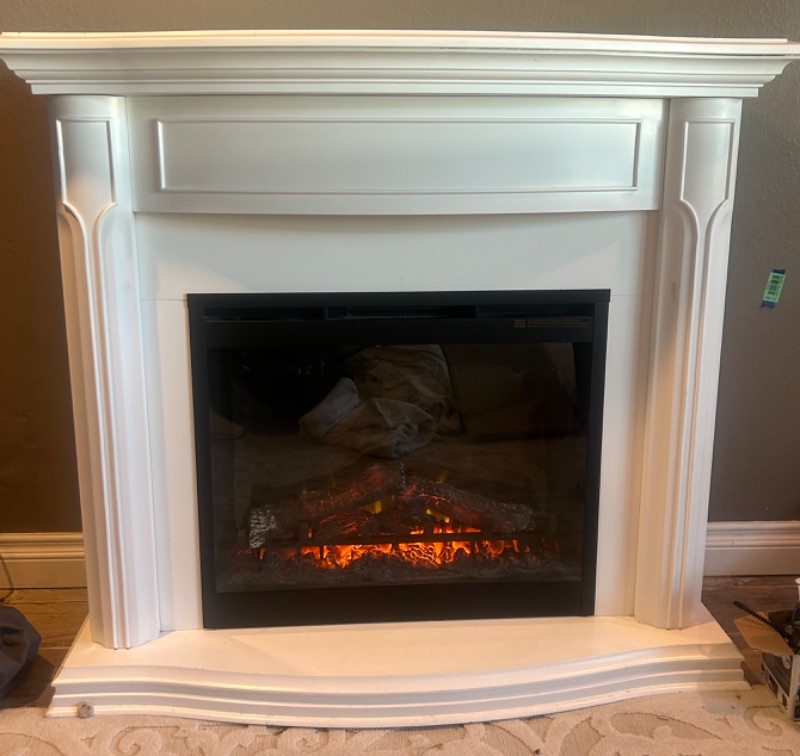 Photo 1 of A WHITE ELECTRICAL FIREPLACE FOR HOME WITH DIMENSIONS OF 47 3/4" X 16 1/2" X H 42".