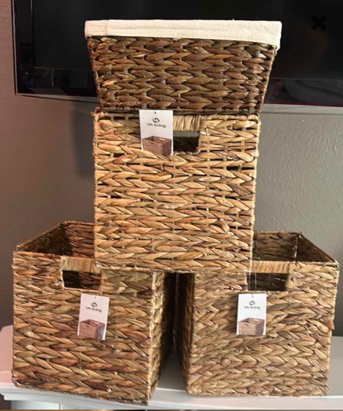 Photo 1 of FOUR WOVEN WICKER STORAGE BASKETS, THREE OF WHICH ARE COLLAPSIBLE.