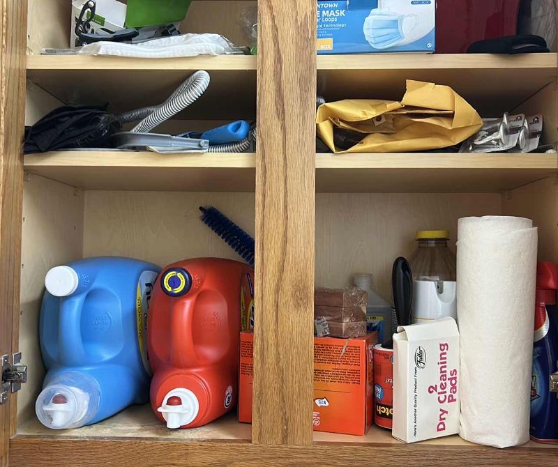 Photo 1 of CONTENTS OF CABINET LAUNDRY