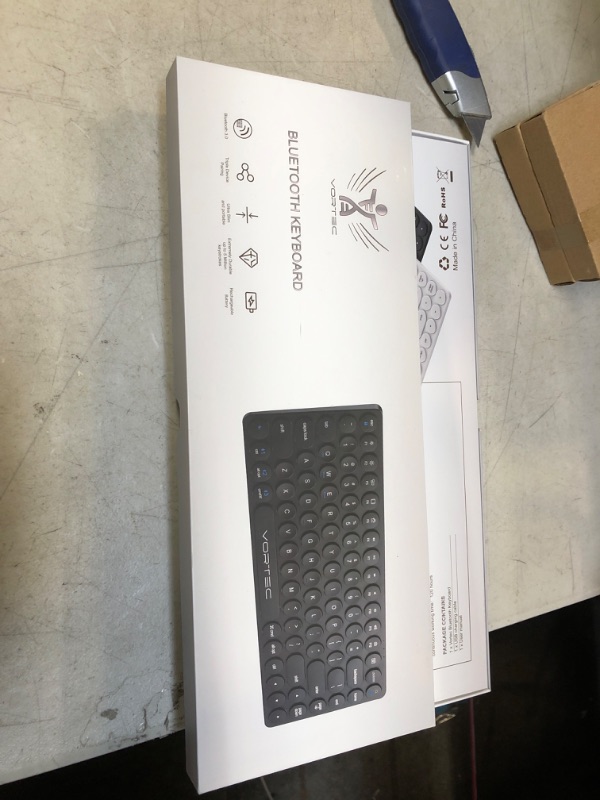 Photo 1 of Vortec Rechargeable Bluetooth Wireless Multi Device Keyboard | Connect 3 Devices Simultaneously | Compatible with iPad, iPhone, Android Phone & Tablet, Mac, PC (Black)