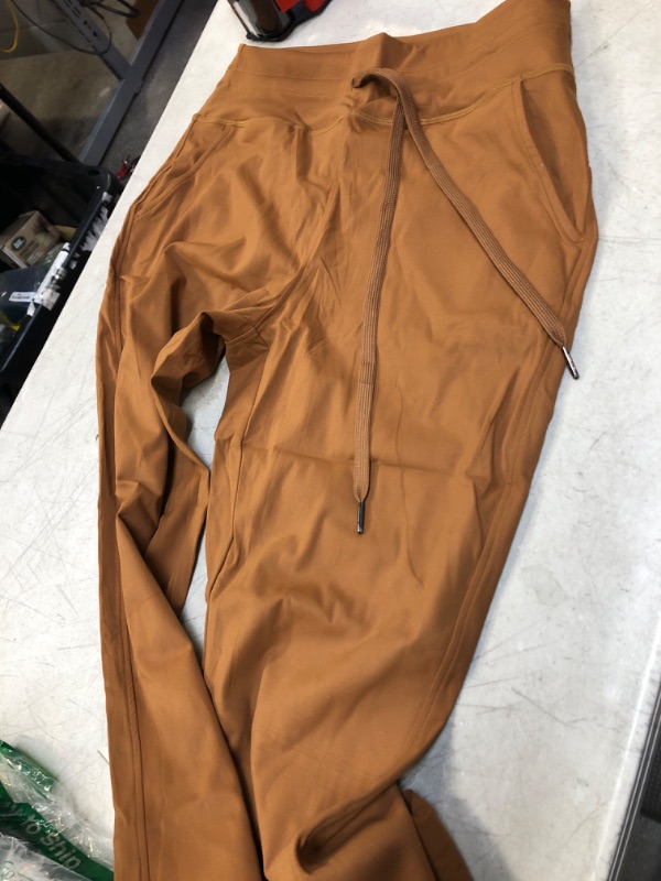 Photo 1 of Dirty Orange Jogger Leggings Size M